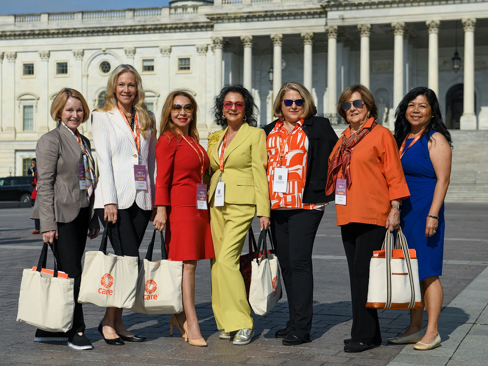 A group of women from CARE Women’s Network in front of the United States capitol building at the Care on the Hill advocacy event.
